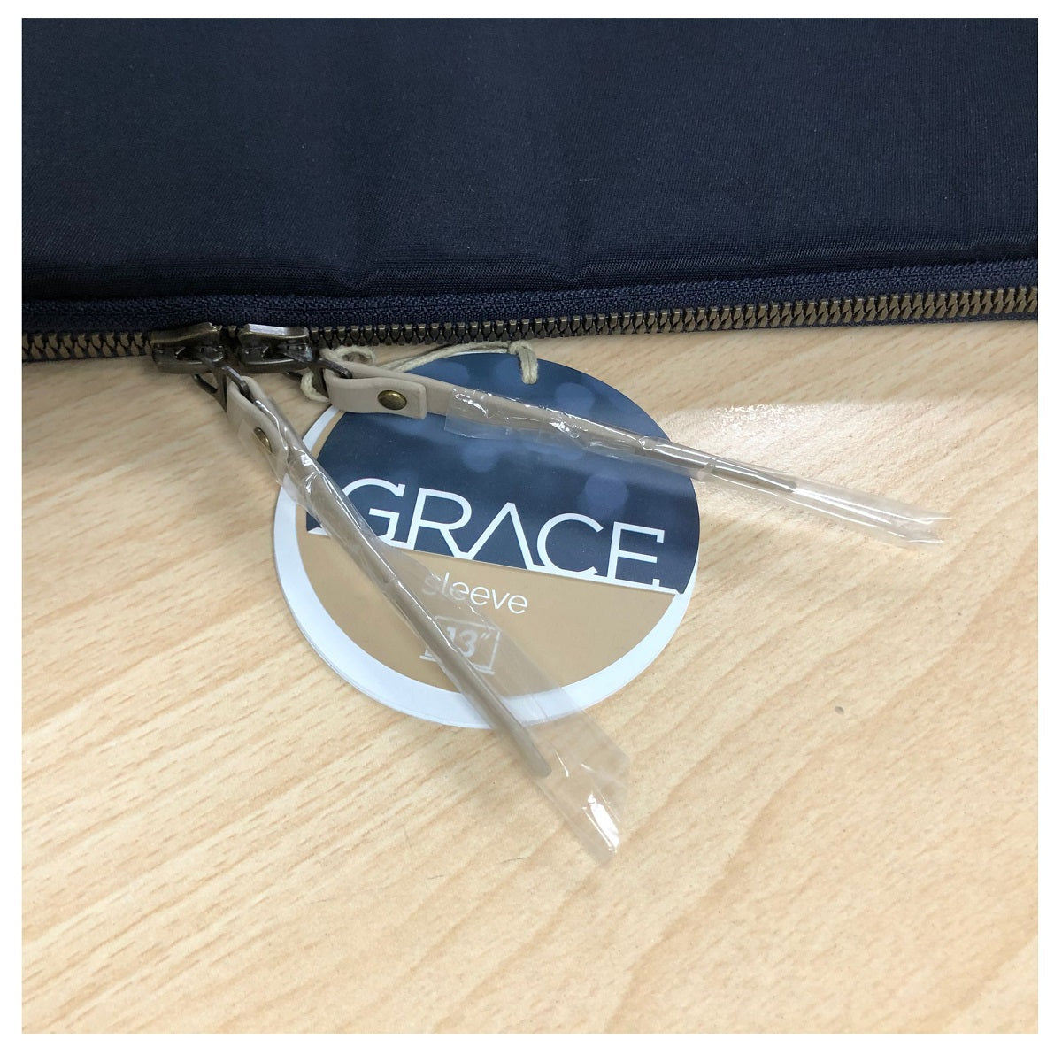 STM-Grace-Sleeve-Might_sky_premium-zipper-pullers_ff12e7bd-6131-4ff9-8f41-fa56d9eb351d.jpg